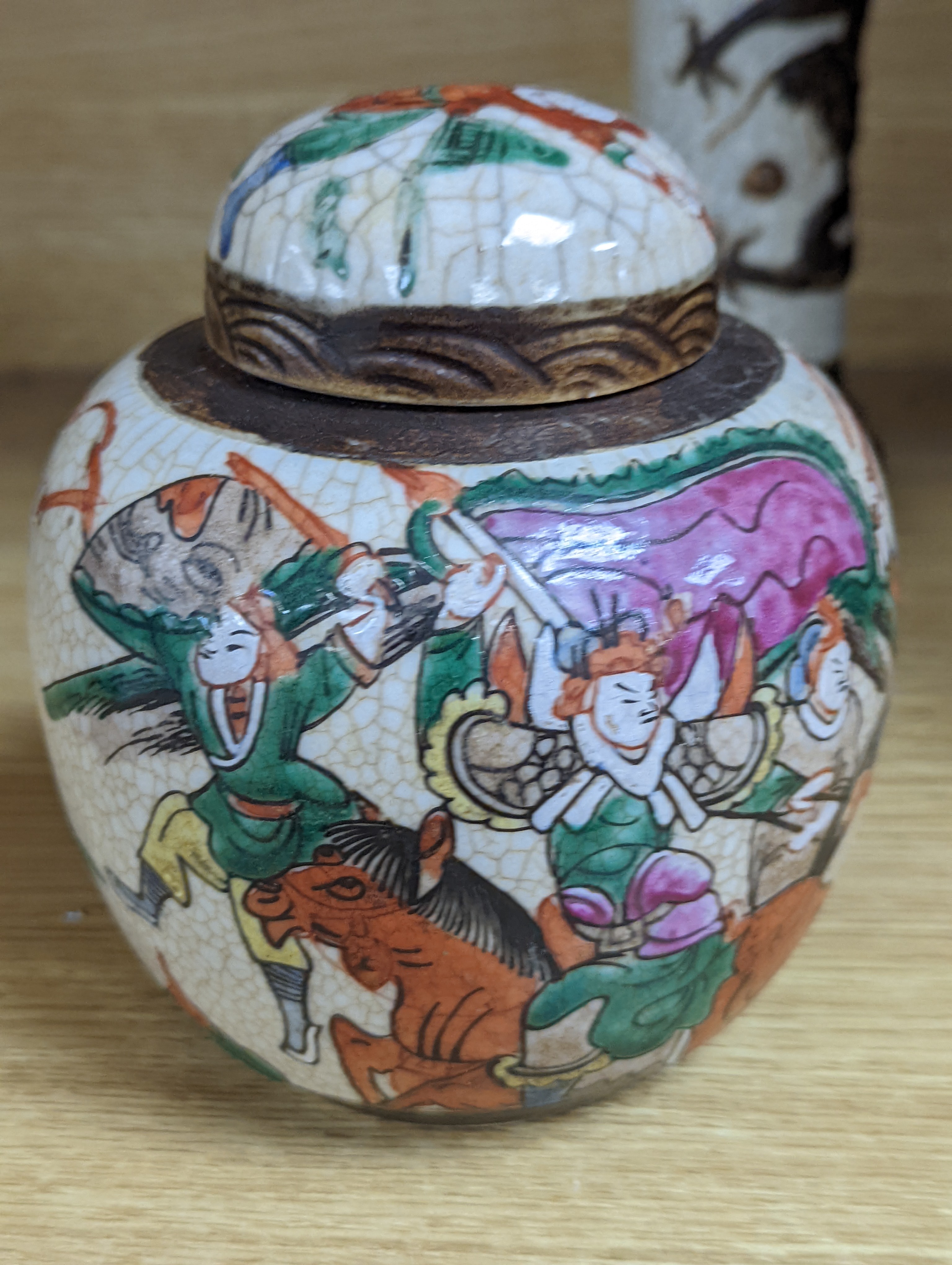 A Chinese famille verte crackle glaze jar and cover, 14.5cm, two famille rose dishes and a crackle glaze ‘dragon’ vase, all late 19th/early 20th century